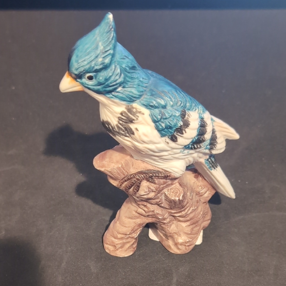 Blue and White Ceramic Bird Figurine on Perch
